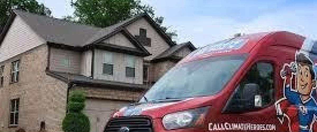 Branded Climate Heroes service van parked in the road in front of a neighborhood home
